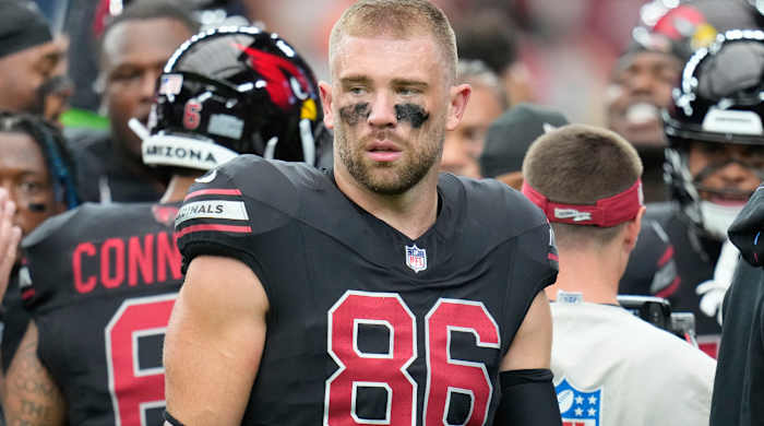 FILE - Arizona Cardinals tight end Zach Ertz pauses on the field prior to an NFL football game against the Cincinnati Bengals Sunday, Oct. 8, 2023, in Glendale, Ariz. The Arizona Cardinals released veteran tight end Zach Ertz on Thursday, Nov. 30, clearing the way for the rapidly-improving Trey McBride to assume the starting role. The 33-year-old Ertz is a three-time Pro Bowl selection who has spent the past five games on injured reserve with a quadriceps injury. (AP Photo/Ross D. Franklin, File)